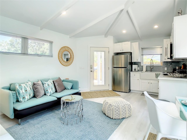 5111 28th Ave N, Saint Petersburg, FL 33710 - living room with light wood-style flooring, recessed lighting, and baseboards