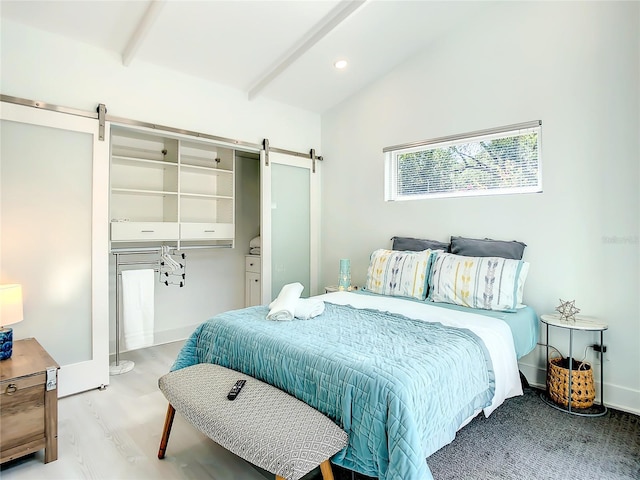 5111 28th Ave N, Saint Petersburg, FL 33710 - bedroom with a barn door and baseboards