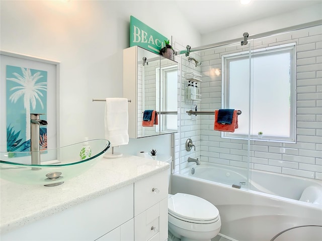 5111 28th Ave N, Saint Petersburg, FL 33710 - full bathroom with toilet, vanity, and washtub / shower combination