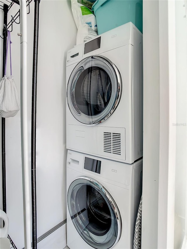 5111 28th Ave N, Saint Petersburg, FL 33710 - clothes washing area with stacked washer / drying machine