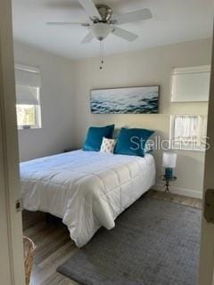 5111 28th Ave N, Saint Petersburg, FL 33710 - bedroom featuring wood finished floors and ceiling fan