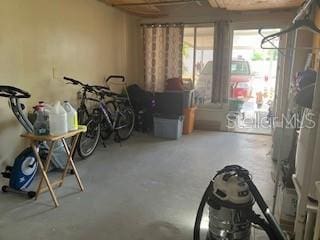 misc room with concrete flooring