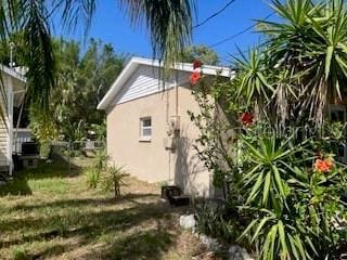7425 W Maryland Ave W, Hudson, FL 34667 - view of property exterior featuring stucco siding