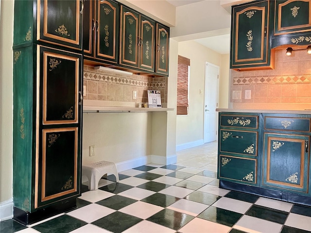 7425 W Maryland Ave W, Hudson, FL 34667 - kitchen featuring decorative backsplash, light countertops, glass insert cabinets, and baseboards