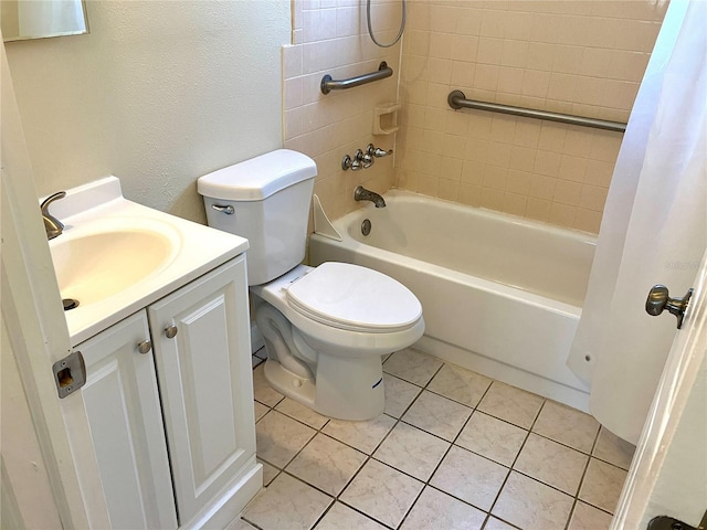 7425 W Maryland Ave W, Hudson, FL 34667 - full bath featuring shower / bath combo, vanity, toilet, a textured wall, and tile patterned floors