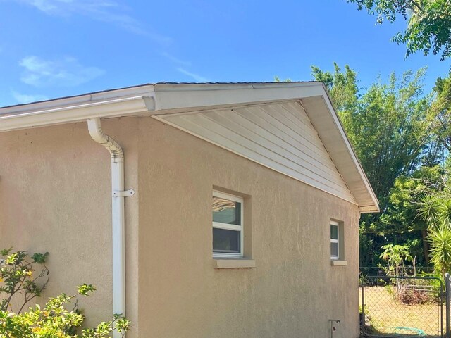 7425 W Maryland Ave W, Hudson, FL 34667 - view of home's exterior featuring stucco siding