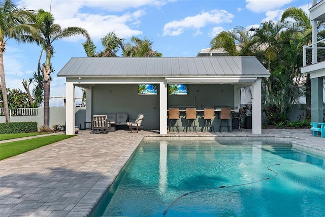 297 1st St W, Tierra Verde, FL 33715 - outdoor pool with a patio area and an outdoor hangout area
