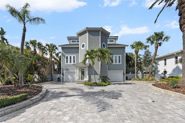 297 1st St W, Tierra Verde, FL 33715 - beach home with a garage and decorative driveway