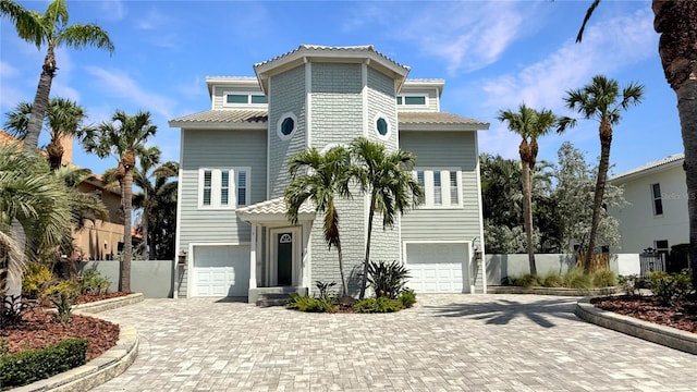297 1st St W, Tierra Verde, FL 33715 - beach home with a garage and decorative driveway