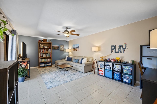 2626 2nd Ct, Palm Harbor, FL 34684 - living area with a ceiling fan and light tile patterned floors