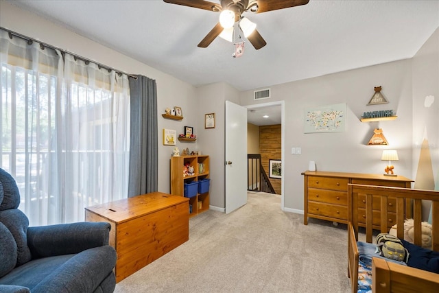 2626 2nd Ct, Palm Harbor, FL 34684 - bedroom with light colored carpet, baseboards, and ceiling fan