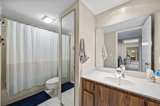 2626 2nd Ct, Palm Harbor, FL 34684 - bathroom featuring tile patterned floors, vanity, toilet, and shower / bath combo