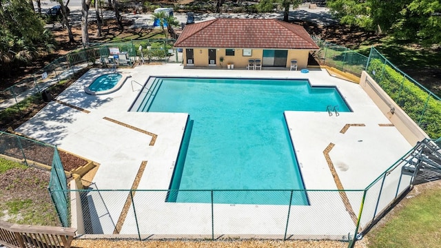 2626 2nd Ct, Palm Harbor, FL 34684 - community pool with fence and a patio