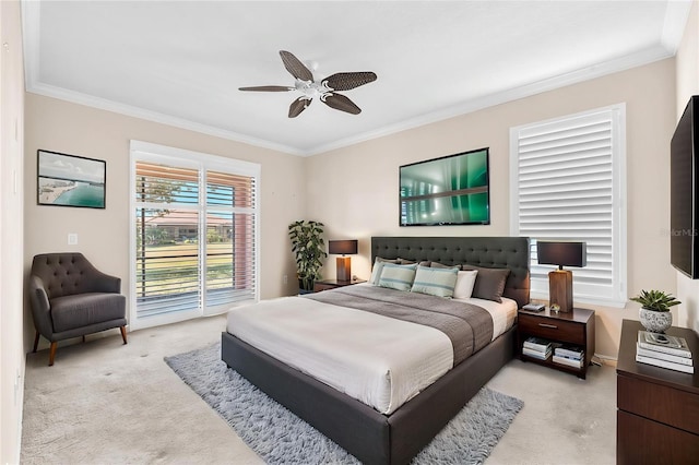 bedroom with light colored carpet, ornamental molding, access to exterior, and ceiling fan