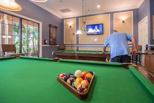 game room with billiards table and ornamental molding