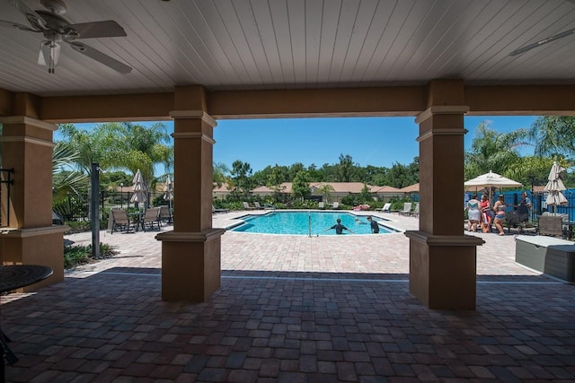 community pool featuring a patio and ceiling fan