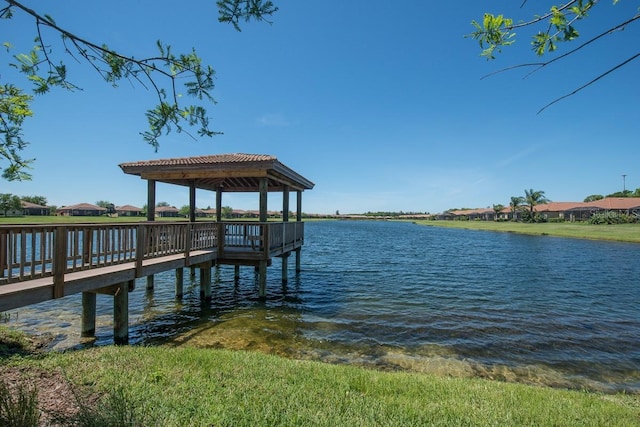 dock area with a gazebo and a water view