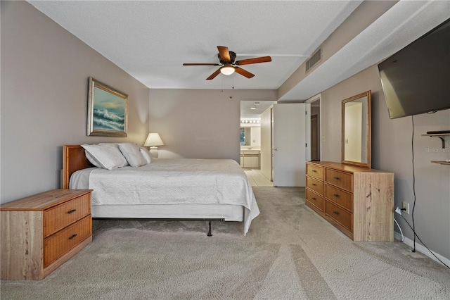 18400 Gulf Blvd Unit 1105, Indian Shores, FL 33785 - bedroom featuring light colored carpet, ensuite bathroom, and ceiling fan