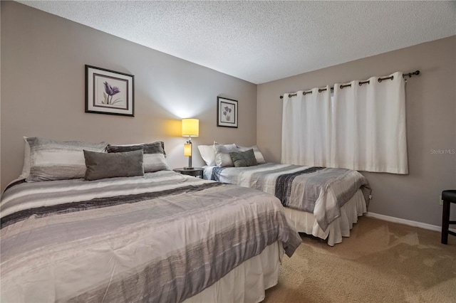 18400 Gulf Blvd Unit 1105, Indian Shores, FL 33785 - bedroom with carpet, baseboards, and a textured ceiling