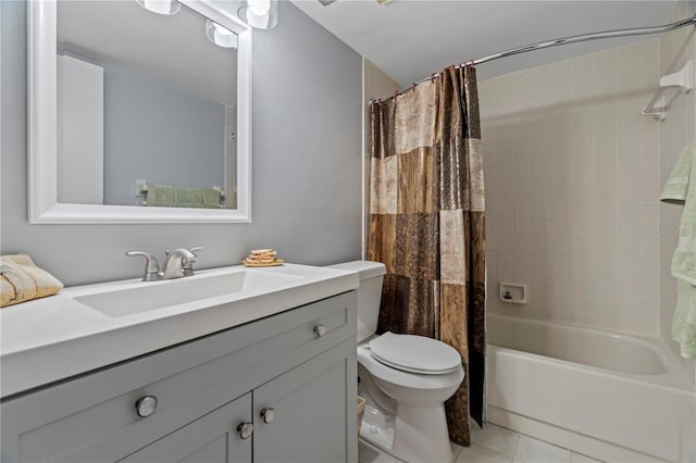 18400 Gulf Blvd Unit 1105, Indian Shores, FL 33785 - bathroom featuring toilet, vanity, tile patterned floors, and shower / bath combo