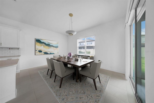 13855 Sharp Hawk Dr, Riverview, FL 33569 - dining room with light tile patterned floors