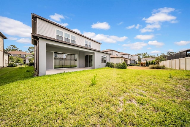 13855 Sharp Hawk Dr, Riverview, FL 33569 - back of house featuring stucco siding and a patio area