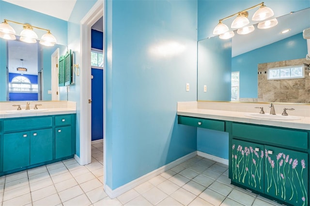 3013 Crest Dr, Clearwater, FL 33759 - bathroom with vanity, tile patterned floors, and baseboards