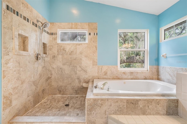 3013 Crest Dr, Clearwater, FL 33759 - full bath featuring a whirlpool tub, tiled shower, and lofted ceiling