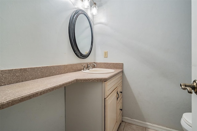 3013 Crest Dr, Clearwater, FL 33759 - bathroom featuring vanity, toilet, and tile patterned floors