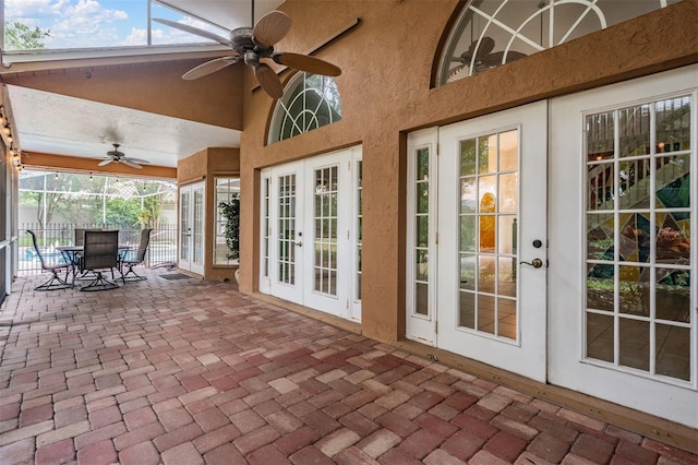 3013 Crest Dr, Clearwater, FL 33759 - view of patio / terrace with french doors, a ceiling fan, and glass enclosure