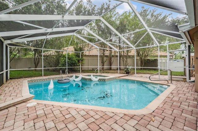 3013 Crest Dr, Clearwater, FL 33759 - view of swimming pool featuring a fenced backyard, a patio, and a pool with connected hot tub