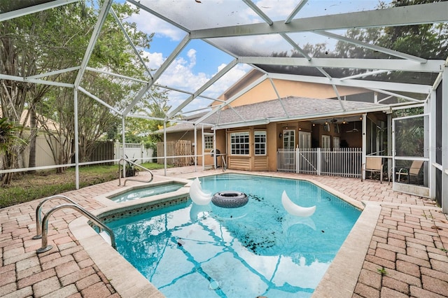 3013 Crest Dr, Clearwater, FL 33759 - view of swimming pool with a patio, glass enclosure, and a ceiling fan