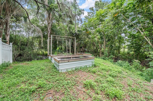 3013 Crest Dr, Clearwater, FL 33759 - view of yard with a garden