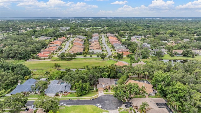 3013 Crest Dr, Clearwater, FL 33759 - aerial overview of property's location with nearby suburban area and a nearby body of water