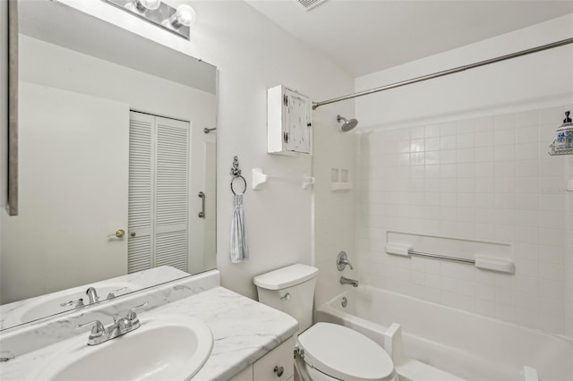bathroom featuring vanity, a closet, toilet, and bathtub / shower combination