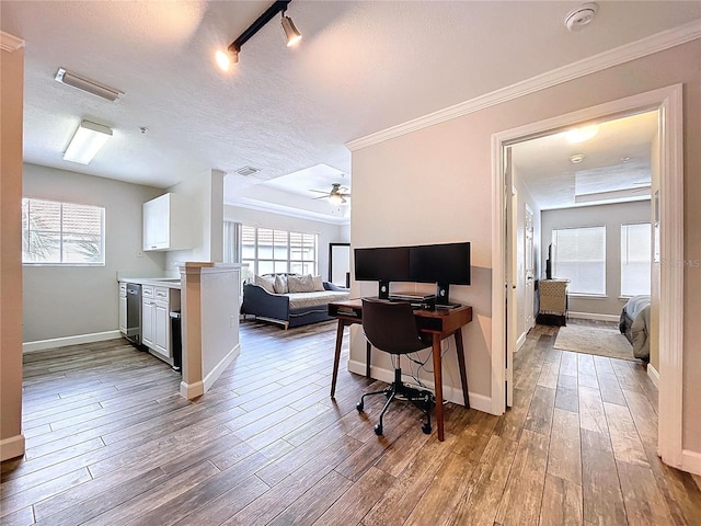 18001 Richmond Place Dr Unit 330, Tampa, FL 33647 - office space with wood finished floors, ceiling fan, baseboards, and crown molding