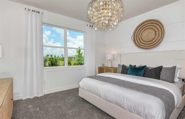 8187 SW 52nd Lane Rd, Ocala, FL 34481 - bedroom with carpet flooring, a chandelier, and baseboards