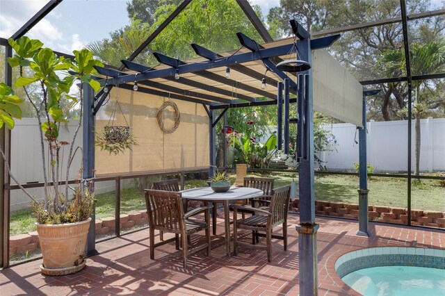 12913 126th Ter, Largo, FL 33774 - view of patio featuring a pergola and outdoor dining space