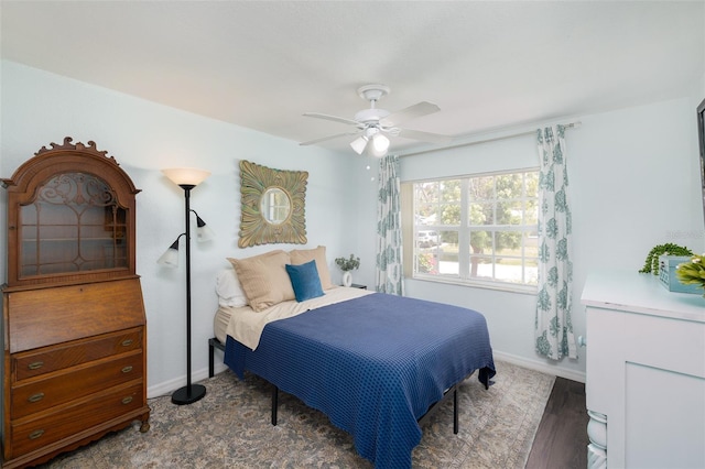 12913 126th Ter, Largo, FL 33774 - bedroom with wood finished floors, baseboards, and ceiling fan