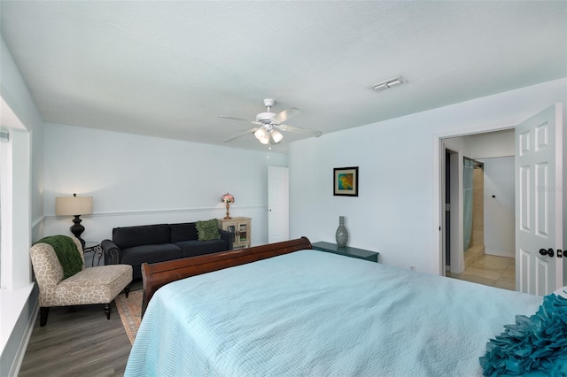 12913 126th Ter, Largo, FL 33774 - bedroom featuring ceiling fan and light wood-style floors