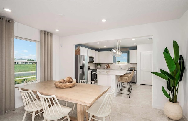 8303 SW 54th Loop, Ocala, FL 34481 - dining room featuring recessed lighting