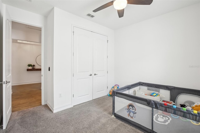 10625 Cardera Dr, Riverview, FL 33578 - bedroom featuring carpet flooring, a closet, ceiling fan, and baseboards