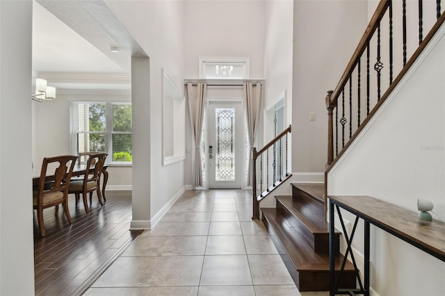 11624 Calf Path Dr, Tampa, FL 33626 - foyer with stairs, baseboards, and a high ceiling