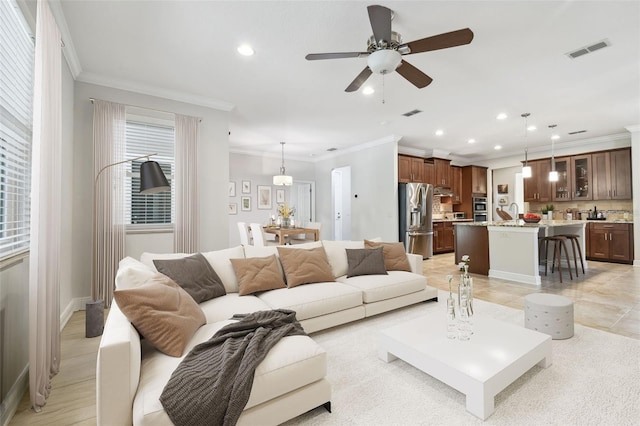 11624 Calf Path Dr, Tampa, FL 33626 - living area with recessed lighting, crown molding, a ceiling fan, and baseboards