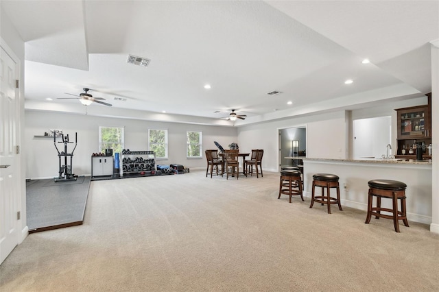 11624 Calf Path Dr, Tampa, FL 33626 - interior space featuring a ceiling fan, light colored carpet, recessed lighting, baseboards, and a raised ceiling