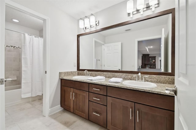 11624 Calf Path Dr, Tampa, FL 33626 - full bath featuring double vanity and shower / bathtub combination with curtain