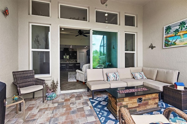 4195 Barletta Ct, Wesley Chapel, FL 33543 - view of patio / terrace featuring an outdoor living space with a fire pit