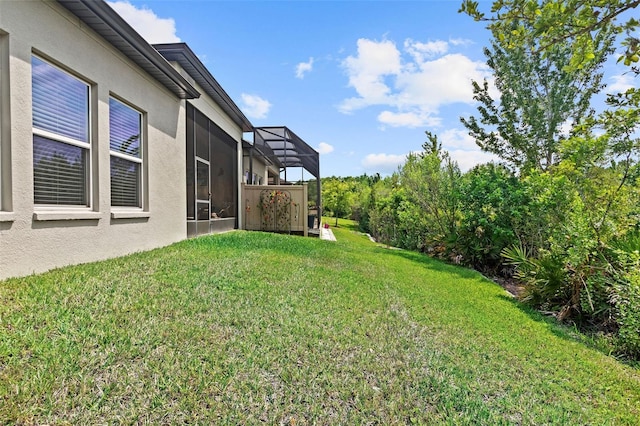 4195 Barletta Ct, Wesley Chapel, FL 33543 - view of green lawn with a lanai