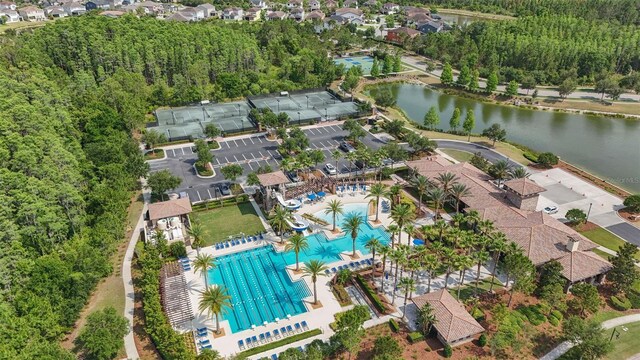 4195 Barletta Ct, Wesley Chapel, FL 33543 - aerial view of property's location with a pool area and a large body of water