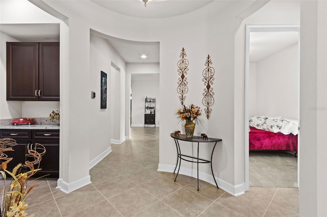 4195 Barletta Ct, Wesley Chapel, FL 33543 - hallway with light tile patterned floors